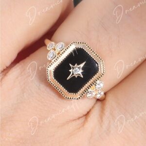 Elegant Black and Gold Ring